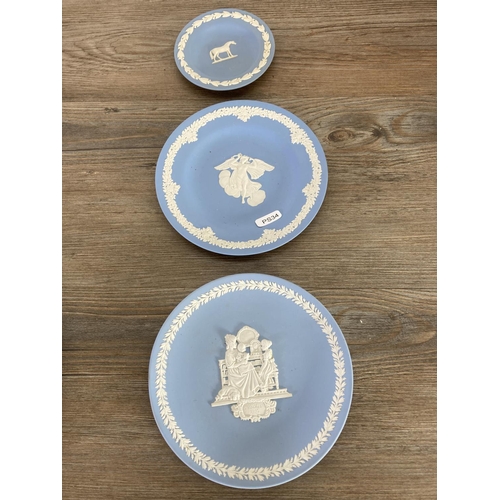 333 - A collection of Wedgwood pale blue Jasperware to include trinket dishes, plates etc.