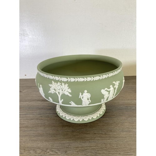 338 - Two Wedgwood sage green Jasperware bowls - largest approx. 13cm high x 20cm diameter