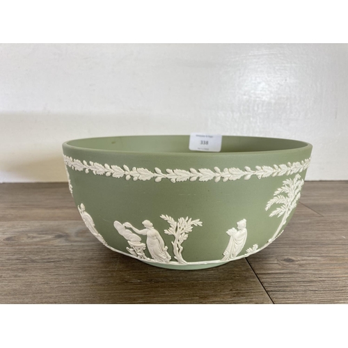 338 - Two Wedgwood sage green Jasperware bowls - largest approx. 13cm high x 20cm diameter