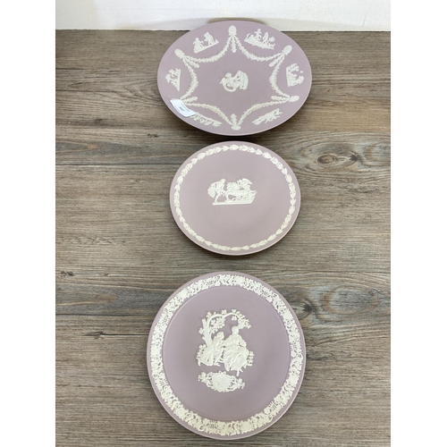 342 - Ten pieces of Wedgwood lilac Jasperware to include 23cm plate, teapot, bell etc.