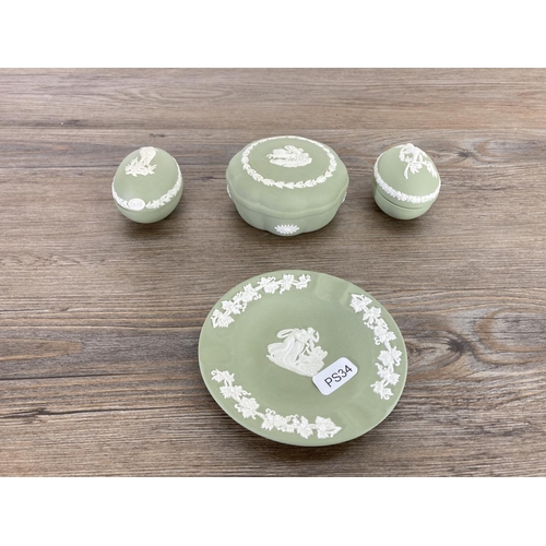 344 - Twelve Wedgwood sage green Jasperware trinket boxes and dishes