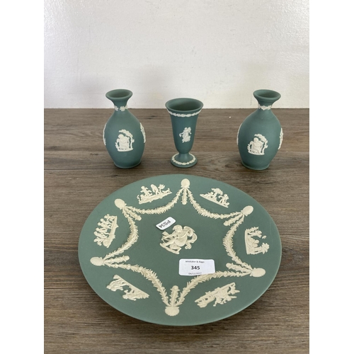 345 - Six pieces of Wedgwood teal Jasperware, three vases, two plaques and one plate