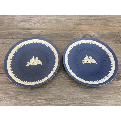 350 - Eleven pieces of Wedgwood Portland blue Jasperware to include two Infant Academy 26cm fluted plates ... 