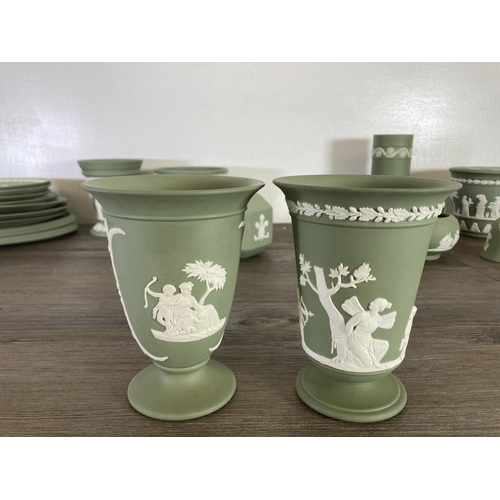 351 - A collection of Wedgwood sage green Jasperware to include The Prince of Wales Caernarvon 1969 money ... 