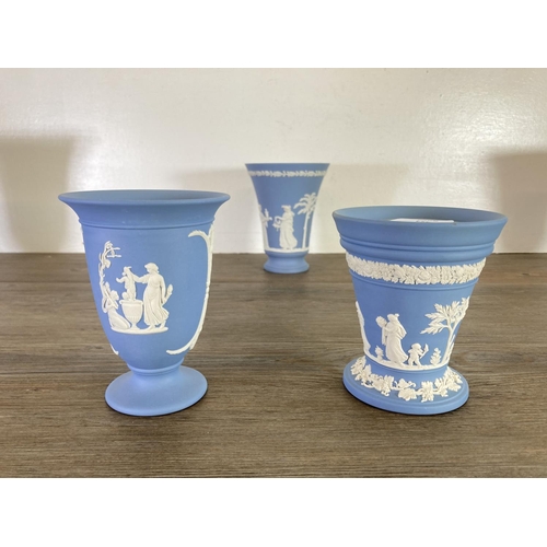 354 - Five Wedgwood pale blue Jasperware vases - largest approx. 19cm high