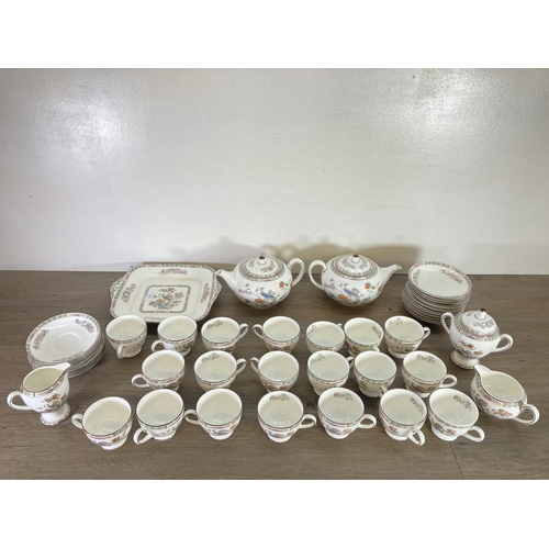 358 - A collection of Wedgwood Kutani Crane bone china to include two teapots, twin handled cake plate, tw... 