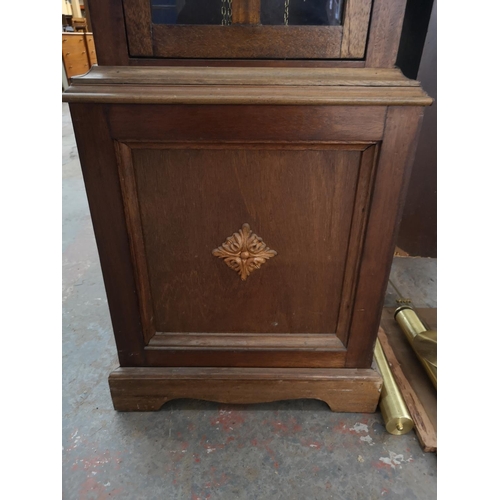 128B - A mahogany grandfather clock with three weights and pendulum - approx. 210cm high x 43cm wide x 24cm... 