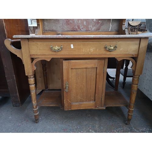 129 - An Edwardian satinwood and marble washstand - approx. 130cm high x 100cm wide x 49cm deep