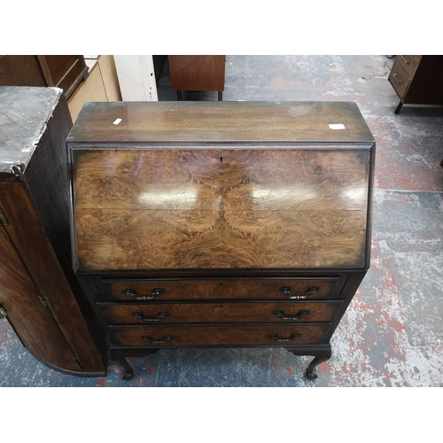 139 - A mid 20th century walnut bureau - approx. 103cm high x 76cm wide x 40cm deep