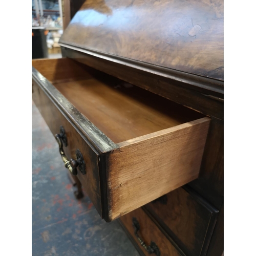 139 - A mid 20th century walnut bureau - approx. 103cm high x 76cm wide x 40cm deep