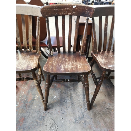 146 - Four chairs, three 19th century style beech farmhouse and one mid 20th century beech metamorphic chi... 