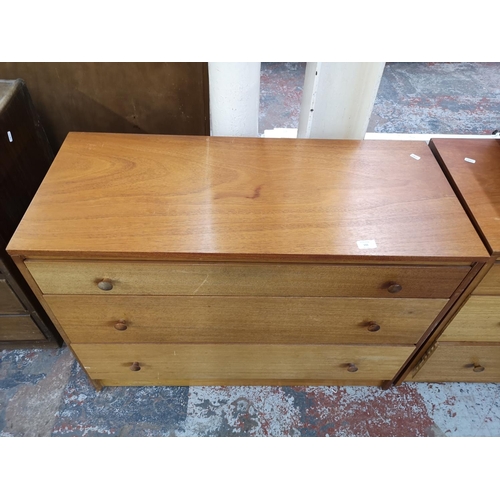 155 - A mid 20th century teak chest of three drawers - approx. 70cm high x 96cm wide x 42cm deep