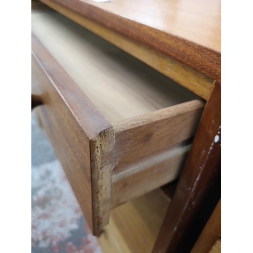 155 - A mid 20th century teak chest of three drawers - approx. 70cm high x 96cm wide x 42cm deep