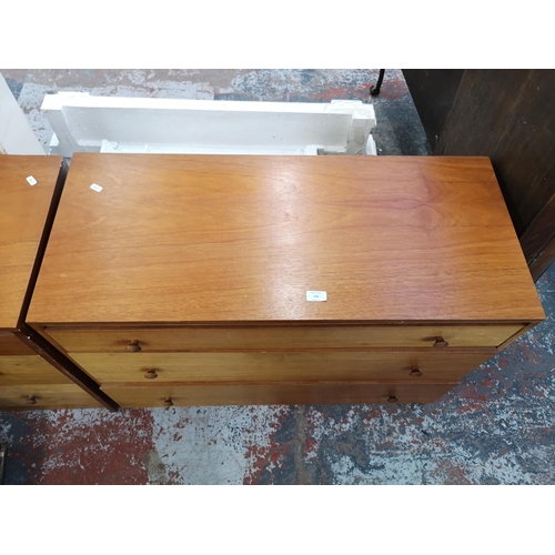 156 - A mid 20th century teak chest of three drawers - approx. 70cm high x 96cm wide x 42cm deep