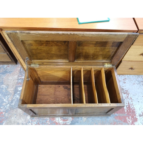 157 - A mid 20th century oak blanket box with later added fitted interior - approx. 42cm high x 79cm wide ... 