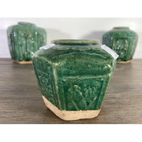 393 - Three Oriental green glazed stoneware vases - largest approx. 16cm high