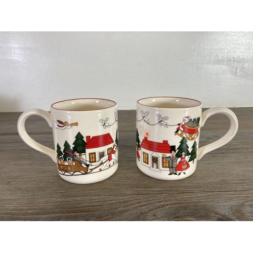 399 - Five pieces of Mason's Christmas Village pottery, two mugs, one cake plate, one milk jug and one sug... 