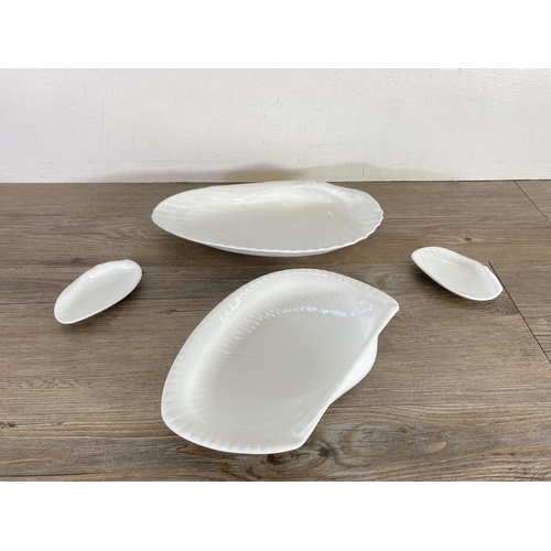 403 - A collection of china to include Wedgwood Edme shell shaped plates, Wedgwood Edme star shaped snack ... 