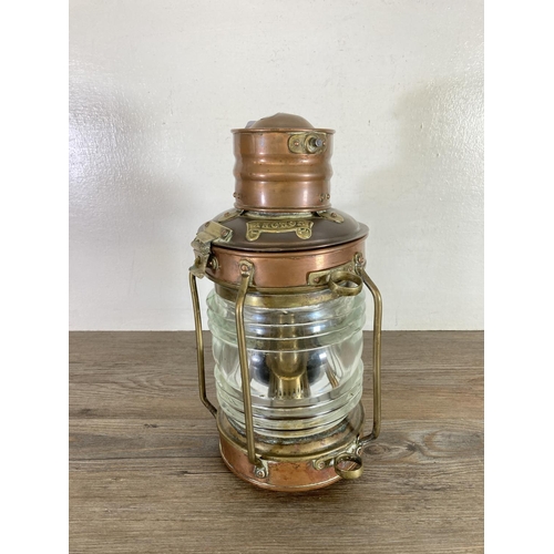 425 - A vintage copper and brass maritime Anchor lantern - approx. 33cm high