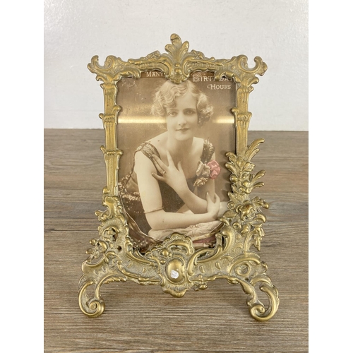 426 - A Rococo style brass photo frame - approx. 23cm high x 17cm wide