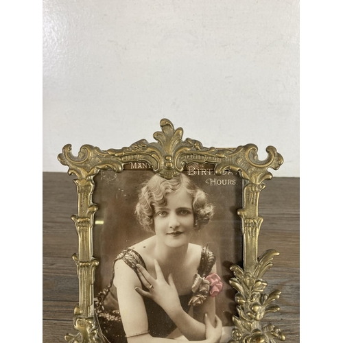 426 - A Rococo style brass photo frame - approx. 23cm high x 17cm wide