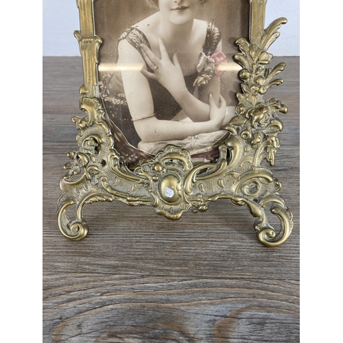 426 - A Rococo style brass photo frame - approx. 23cm high x 17cm wide