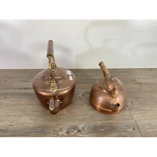 432 - Two copper kettles, one Portuguese and one Victorian with acorn finial