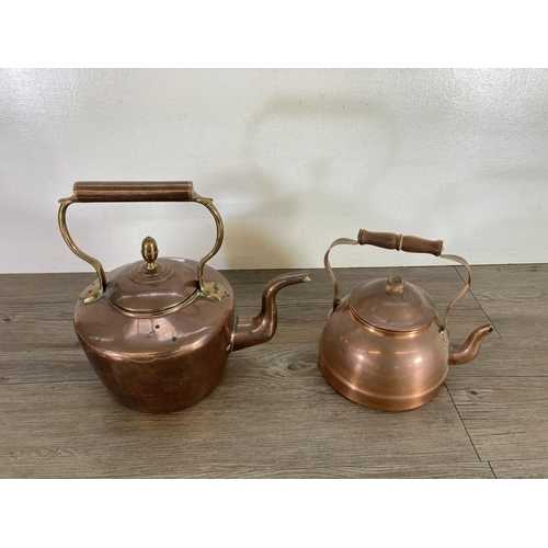 432 - Two copper kettles, one Portuguese and one Victorian with acorn finial