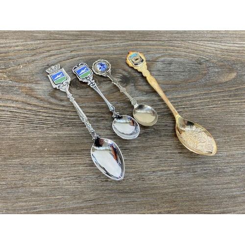 433 - A collection of silver plated souvenir teaspoons and a boxed Walker & Hall hallmarked Sheffield silv... 