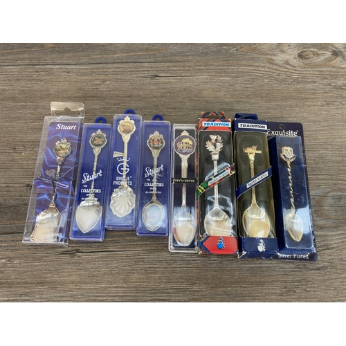 433 - A collection of silver plated souvenir teaspoons and a boxed Walker & Hall hallmarked Sheffield silv... 