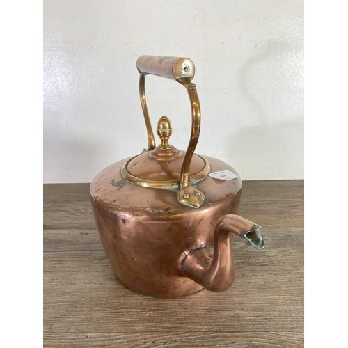 438 - A Victorian copper kettle with acorn finial - approx. 29cm high