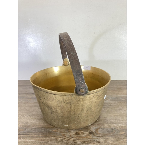 447 - A Victorian brass preserve pan - approx. 16cm high x 30cm diameter (excluding handle)