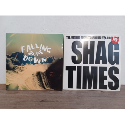 852 - Two vinyl records, one Oasis 'Falling Down - Chemical Brothers remix' one sided promo 12