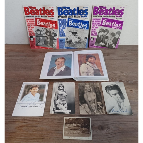 860 - A collection of items to include three 1976 The Beatles Appreciation Society magazines, signed Danie... 