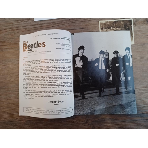 860 - A collection of items to include three 1976 The Beatles Appreciation Society magazines, signed Danie... 