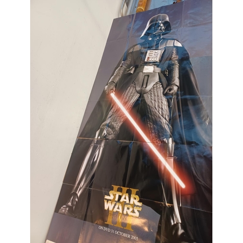 863 - A collection of film posters and merchandise to include four Star Wars two sided posters, Terminator... 