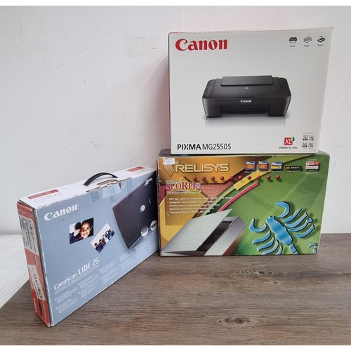 868 - Three boxed items, one Relisys Scorpio Pro Series multimedia colour scanner, one Canon CanoScan Lide... 