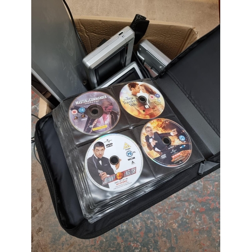 872 - A box containing DVD wallet with contents, Hyundai DVD player, Venturer portable DVD player with dua... 