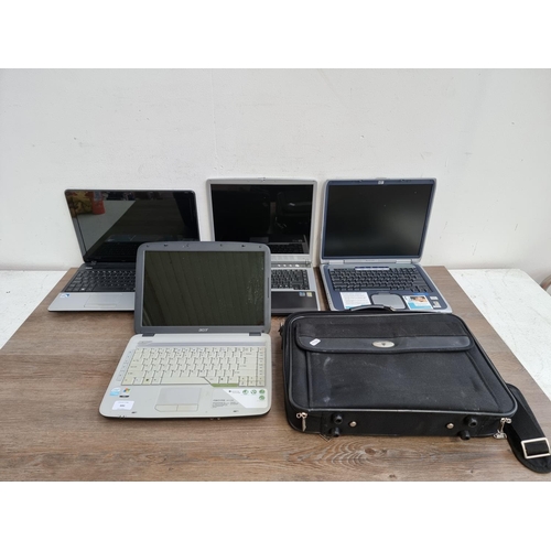 886 - Four laptops, one cased Packard Bell Windows 8, one Acer Windows Vista, one HP Windows XP Home Editi... 