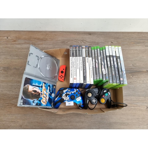 888 - A collection of console gaming items to include five Xbox One game discs, Nintendo Game Cube control... 