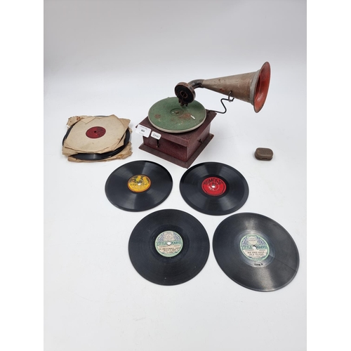 484 - A vintage tin plate child's gramophone with set of vintage Win needles and various 6