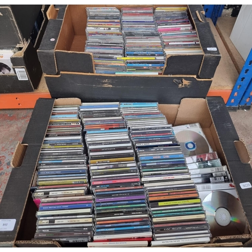 843 - Two boxes containing a collection of CD singles