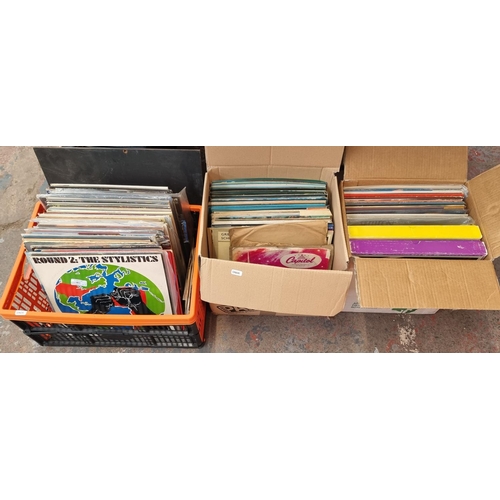 851 - Three boxes containing a collection of vinyl and shellac records to include The Stylistics, Faith Ho... 