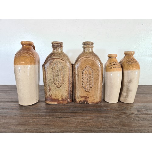 385 - A collection of 19th century stoneware bottles to include G Turner Wine Merchants Stockport, W. Turn... 