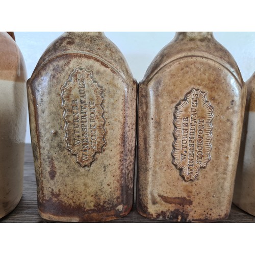 385 - A collection of 19th century stoneware bottles to include G Turner Wine Merchants Stockport, W. Turn... 