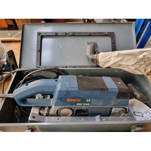 206 - Two cased Bosch 240v handheld power tools, GST100BCE jig saw and GBS75AE sander with instruction man... 