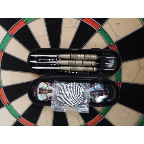 193 - A Winmau wooden cased dartboard