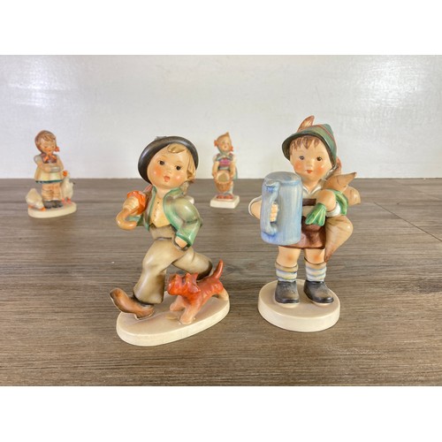 417 - Twelve items, six West German Goebel Hummel figurines and six Royal Doulton miniature character jugs