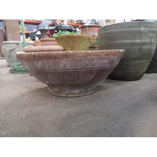 249A - Five various terracotta and glazed planters - largest approx. 34cm high x 37cm diameter