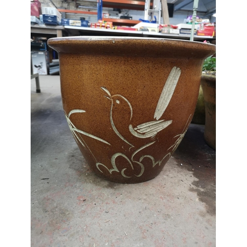 249A - Five various terracotta and glazed planters - largest approx. 34cm high x 37cm diameter